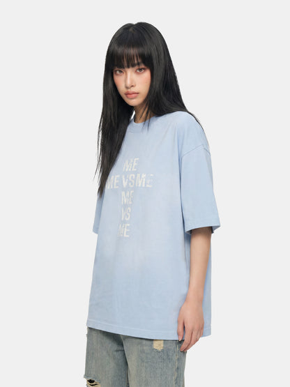 Camiseta azul brumoso lavado con cruz